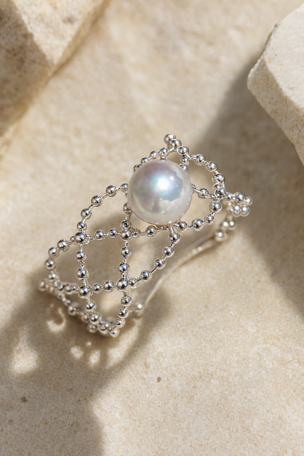 Close-up of Aurora Luster 5-6mm ring showing pearl luster, nacre and craftsmanship detail