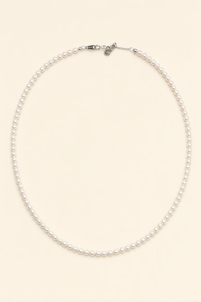 Mirror Luster 2–3mm Cultured Freshwater Pearl necklace on a cream white background