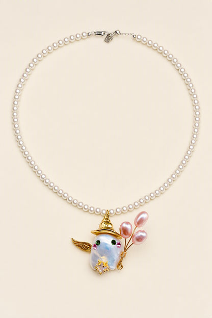 Winged Ghost with Pink Pearl Stems Halloween baroque pearl pendant with a white small pearl necklace by Pearlivo