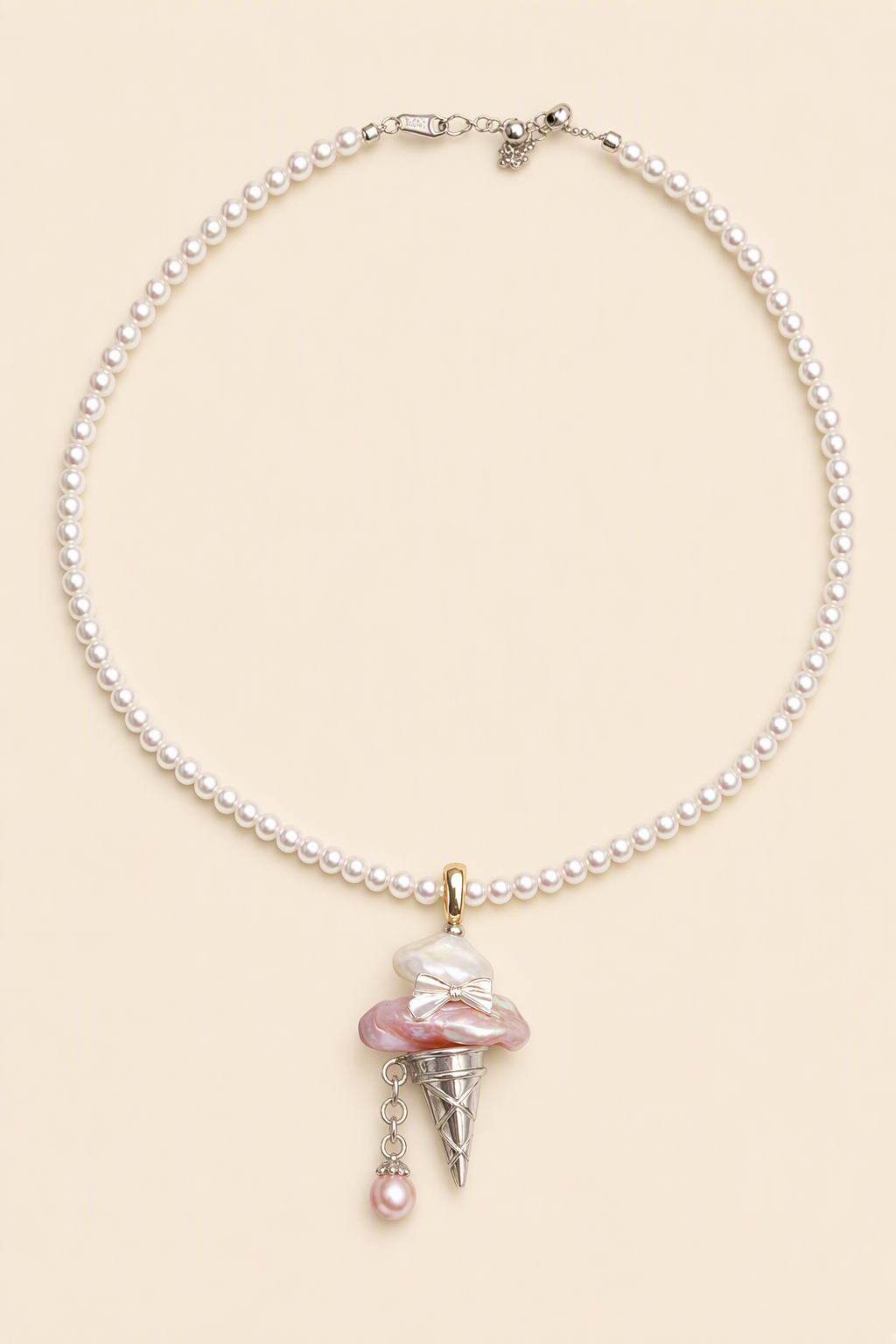 Ice Cream Devil baroque pearl pendant with a white small pearl necklace by Pearlivo