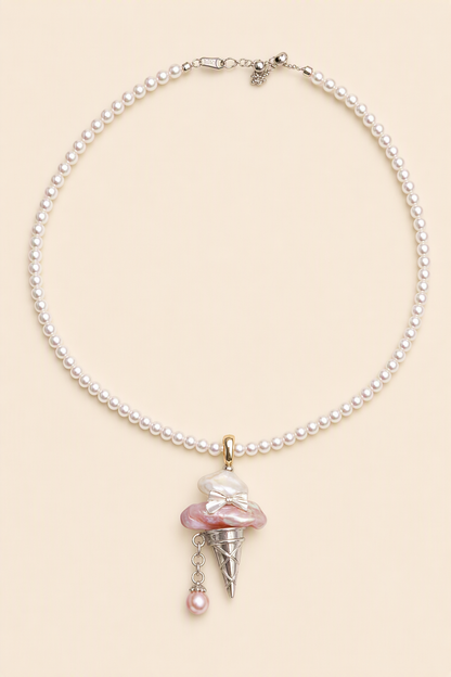 Ice Cream Devil baroque pearl pendant with a white small pearl necklace by Pearlivo
