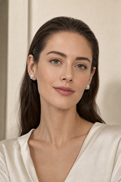 Model wearing Mirror Luster 10–13 mm Freshwater Pearl stud earrings naturally at the earlobe