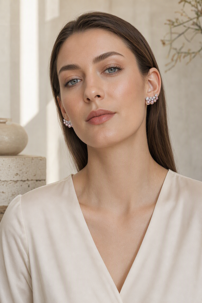 Mirror Luster 3–8 mm Graduated Freshwater Pearl stud earrings in an elegant still-life luxury setting