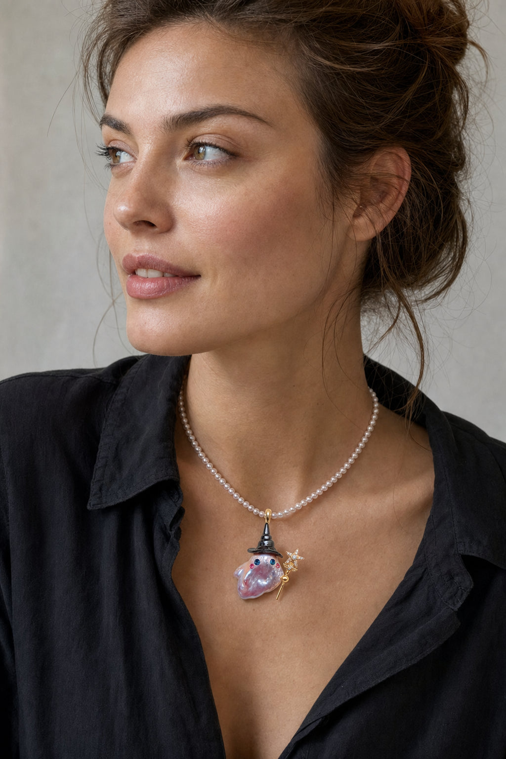 Western model wearing the Witch Hat with Star Wand Halloween baroque pearl pendant necklace by Pearlivo