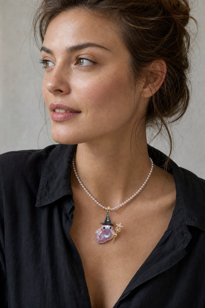Western model wearing the Witch Hat with Star Wand Halloween baroque pearl pendant necklace by Pearlivo