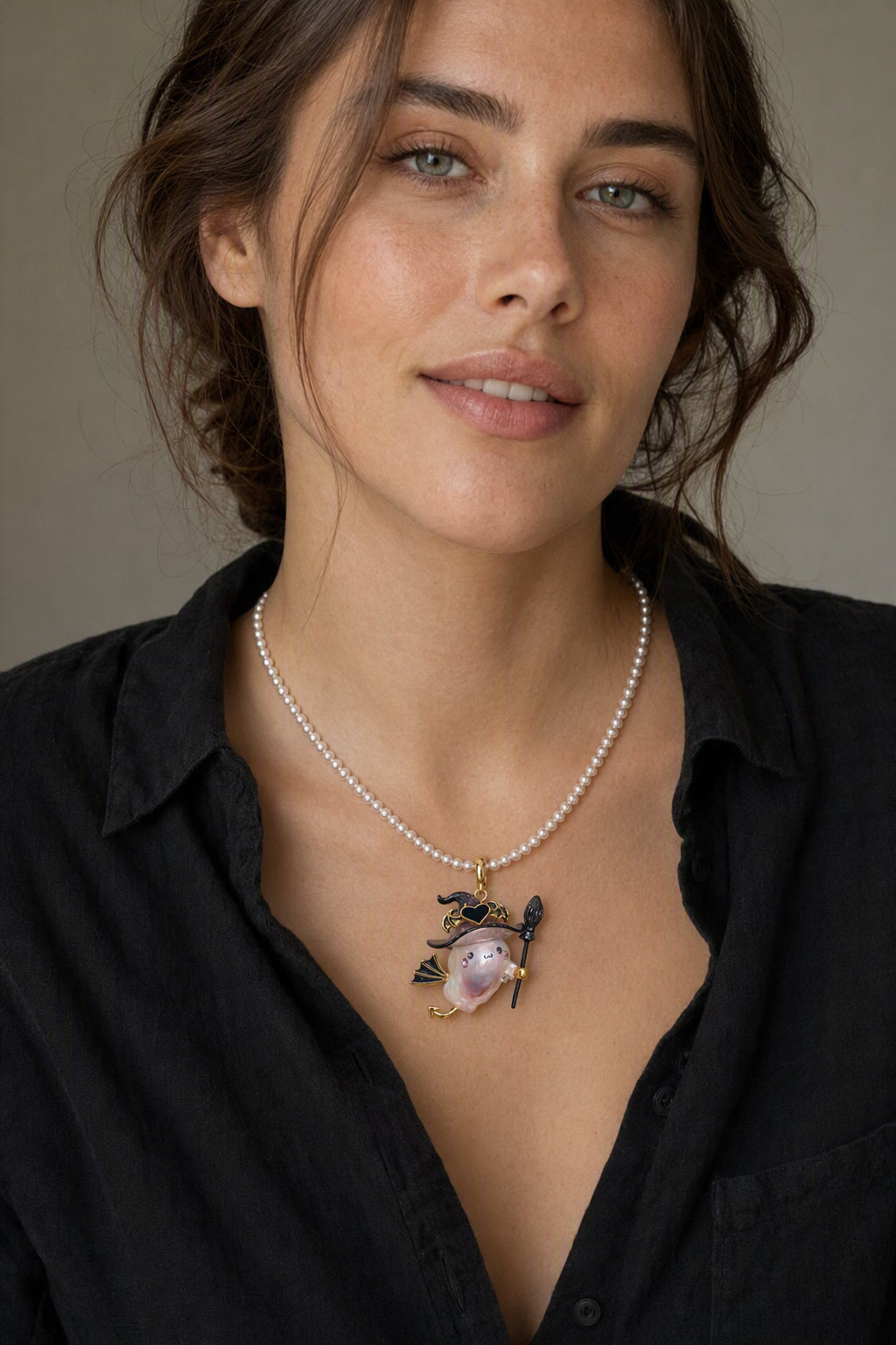 Western model wearing the Bat Wing Witch Ghost Halloween baroque pearl pendant necklace by Pearlivo