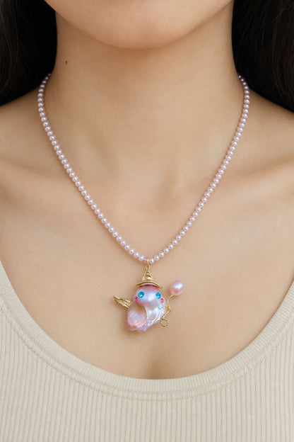 Western model wearing the Winged Unicorn Ghost with Balloon Halloween baroque pearl pendant necklace by Pearlivo
