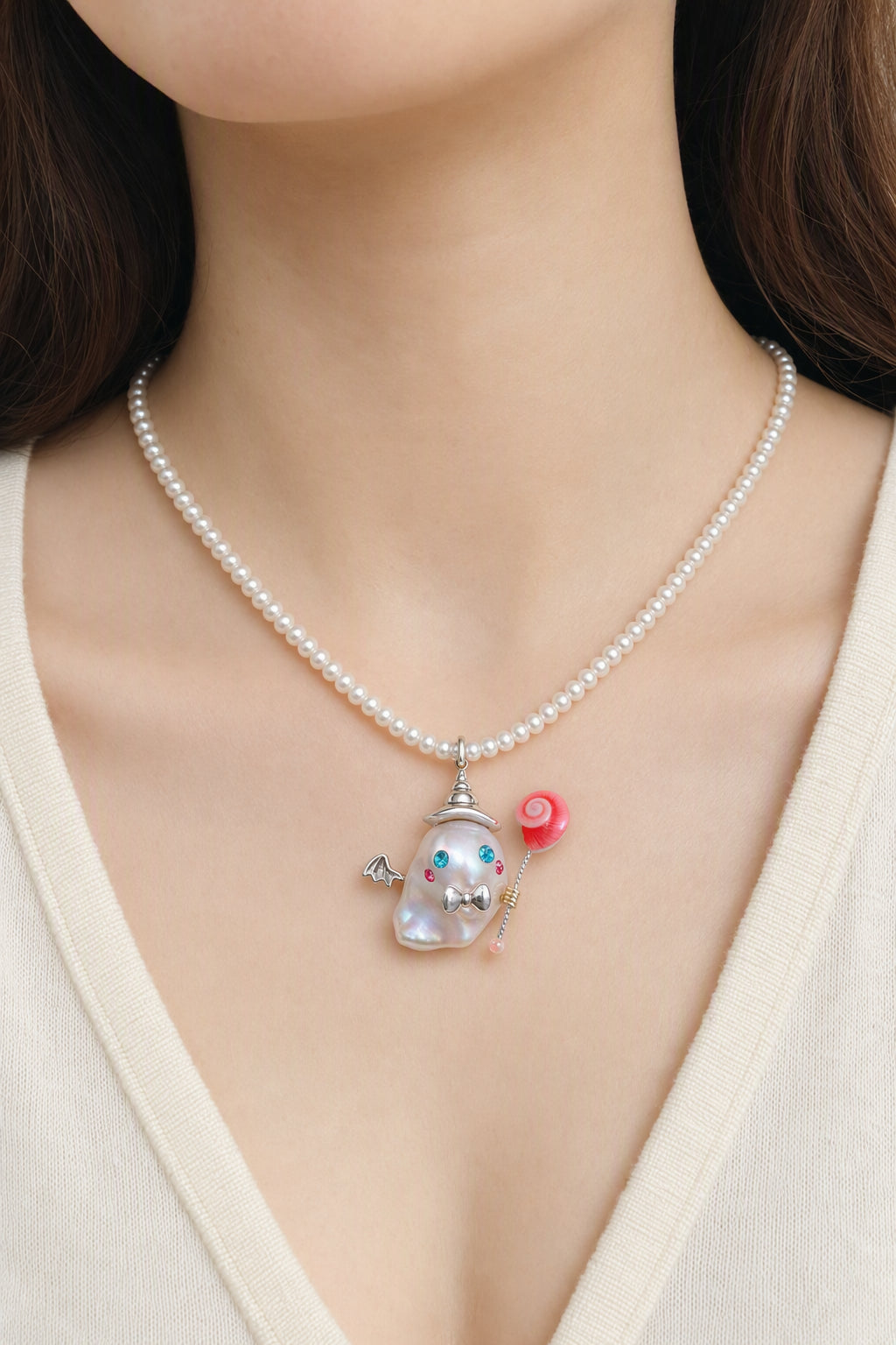 Western model wearing the Bow and Lollipop Ghost Halloween baroque pearl pendant necklace by Pearlivo