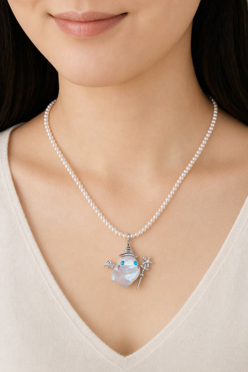 Western model wearing the Whimsical Wizard Ghost Halloween baroque pearl pendant necklace by Pearlivo
