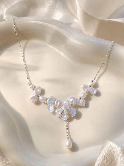 White baroque freshwater pearl necklace with floral cluster design and mirror-like luster