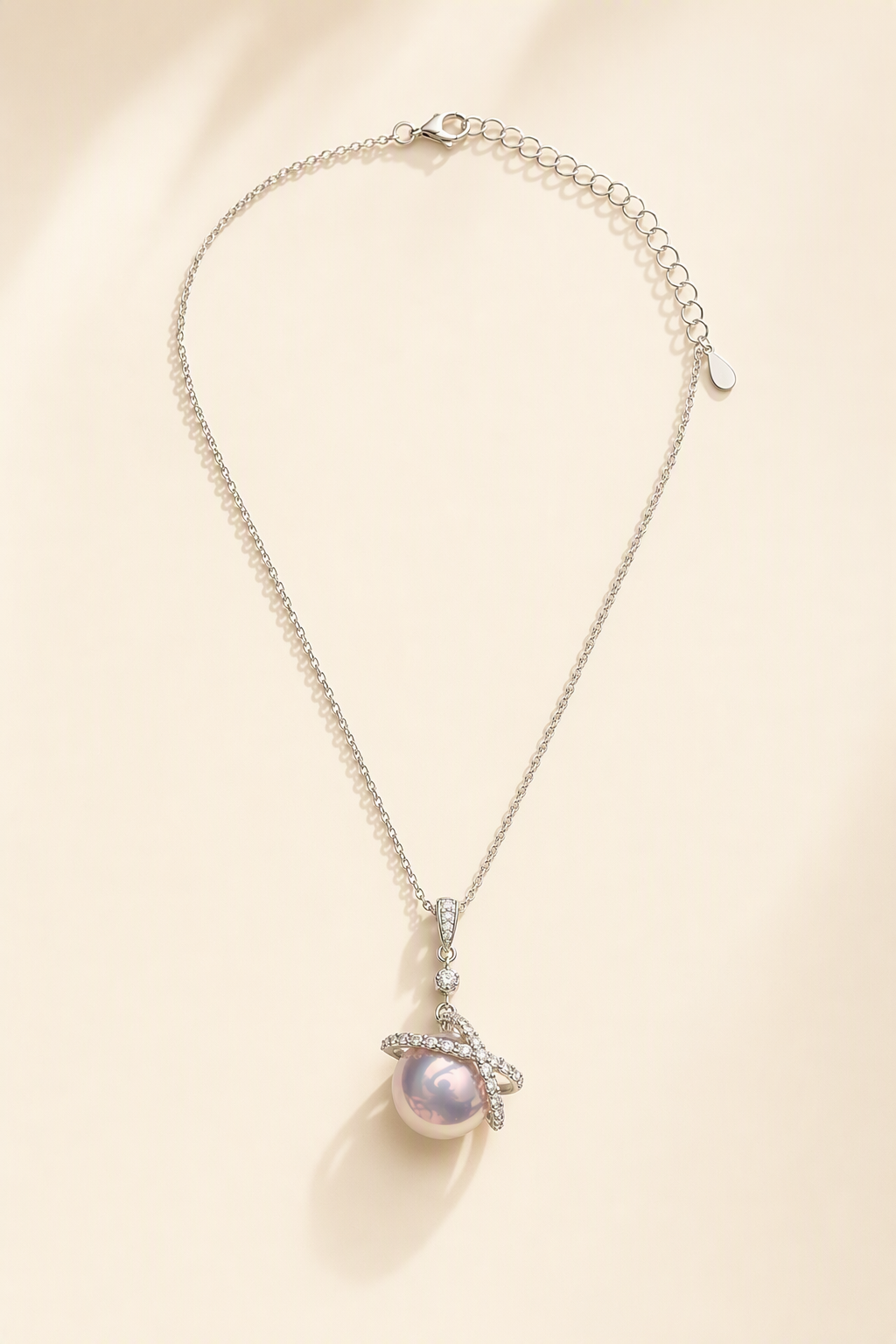 Mirror Luster 11–12 mm Freshwater Pearl necklace on a cream white background