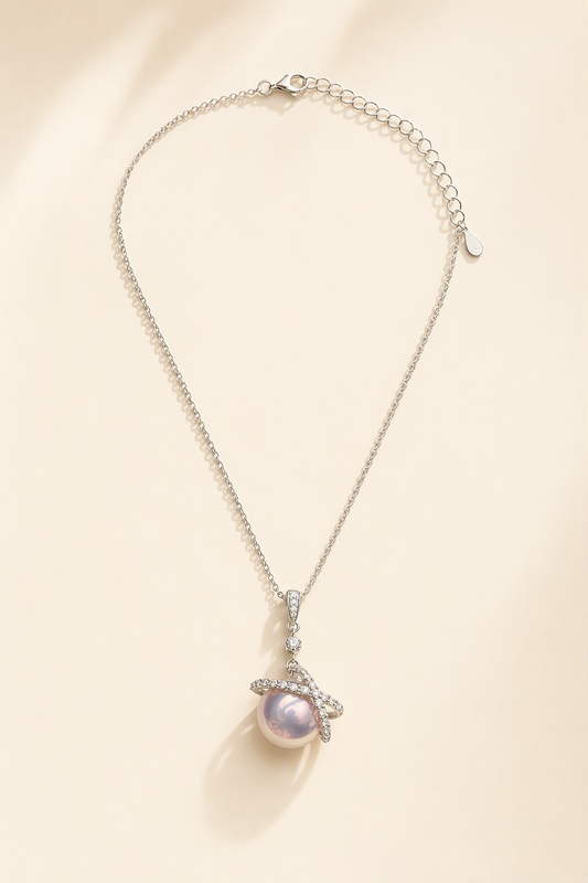 Mirror Luster 11–12 mm Freshwater Pearl necklace on a cream white background