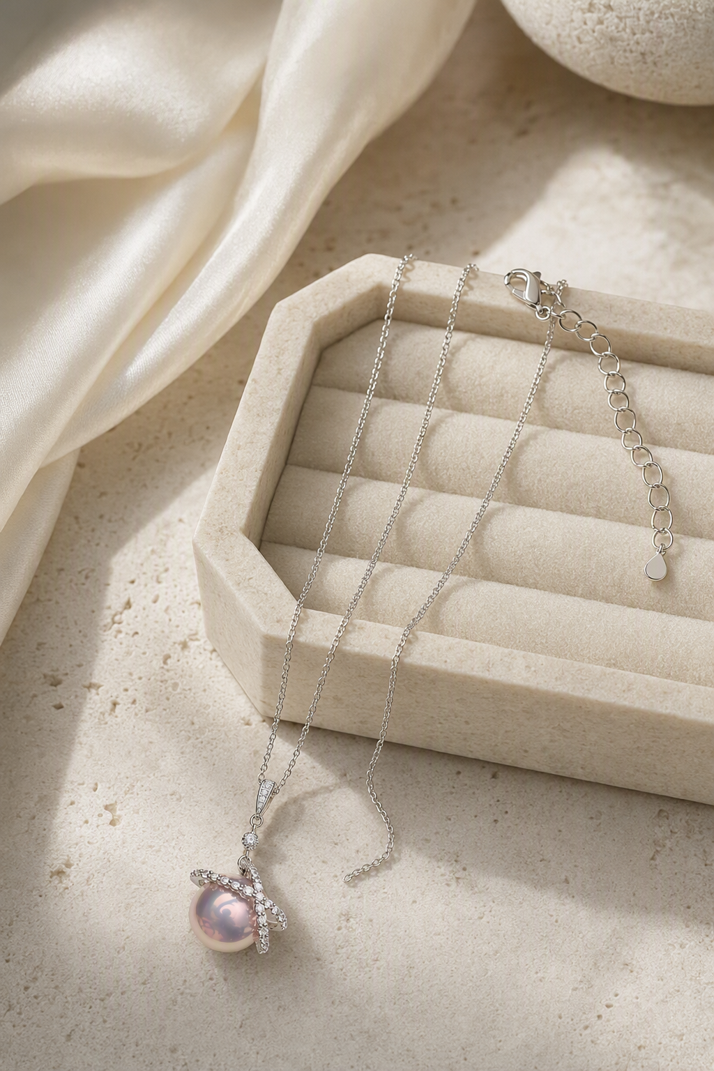 Mirror Luster 11–12 mm Freshwater Pearl necklace in an elegant still-life luxury setting