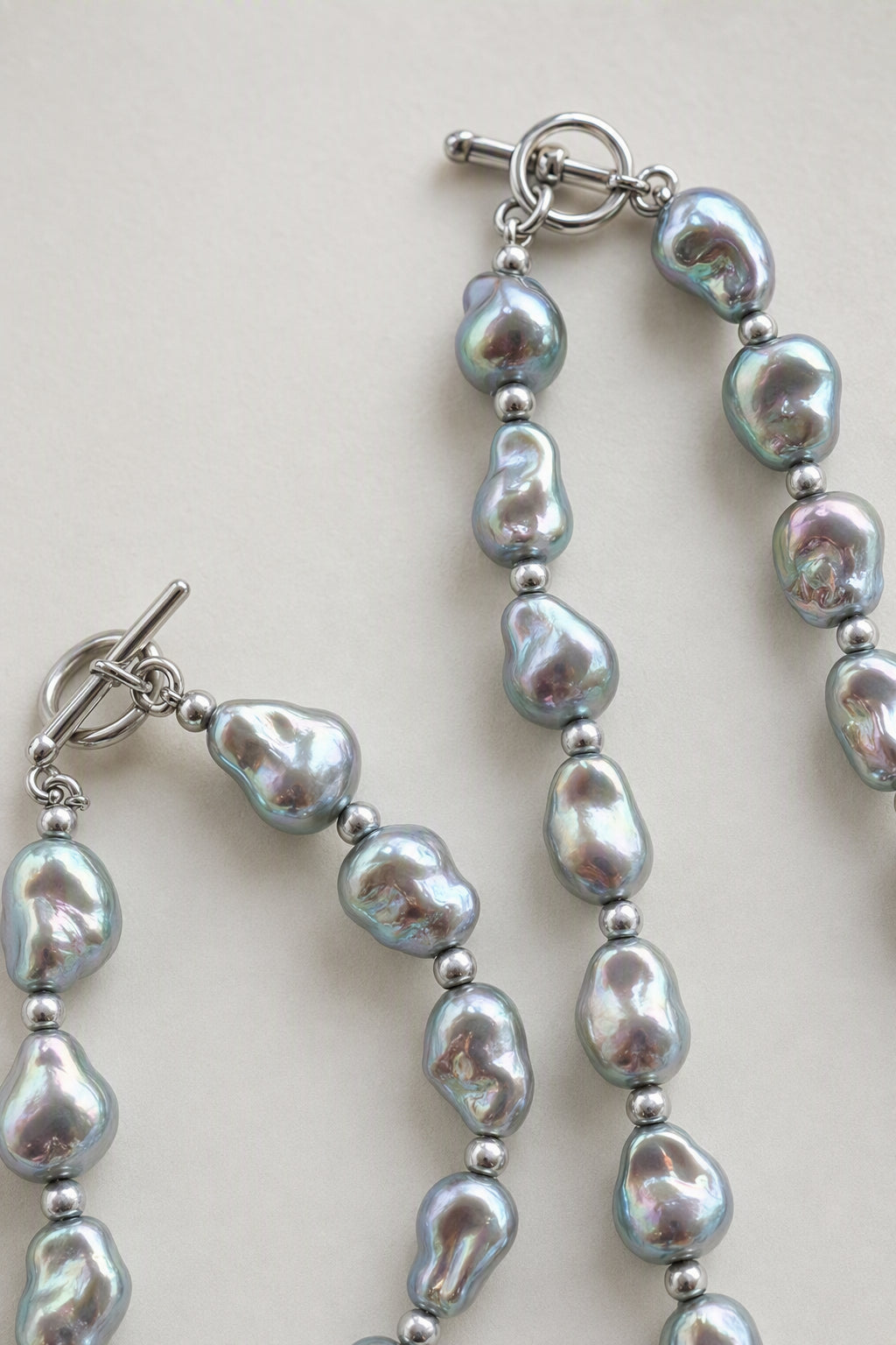 Silver-Blue Baroque Pearl Necklace and Bracelet Set — pearl luster and surface detail