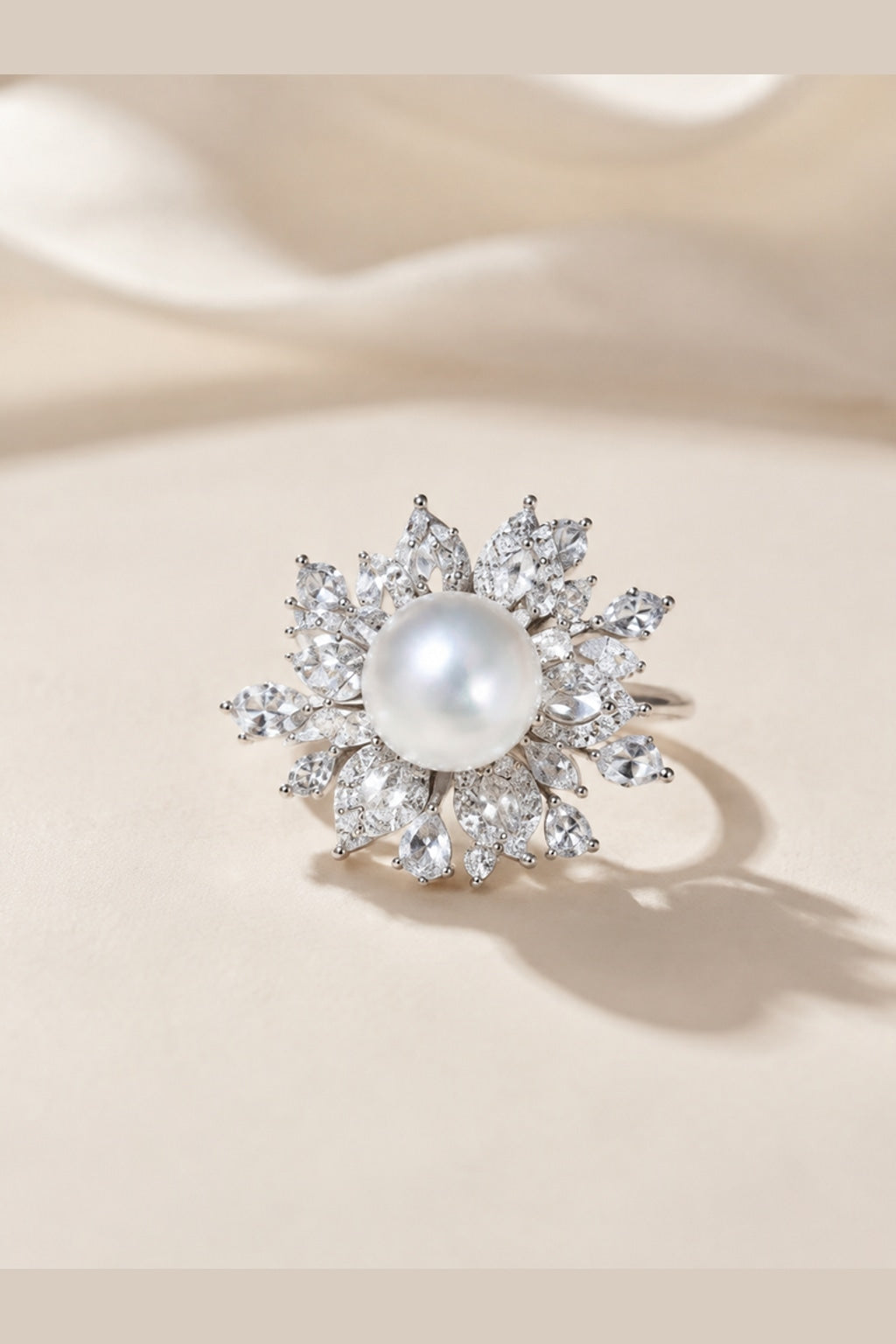 Venus Luster 10-11mm Australian South Sea Pearl Firework Ring on a cream white primary background