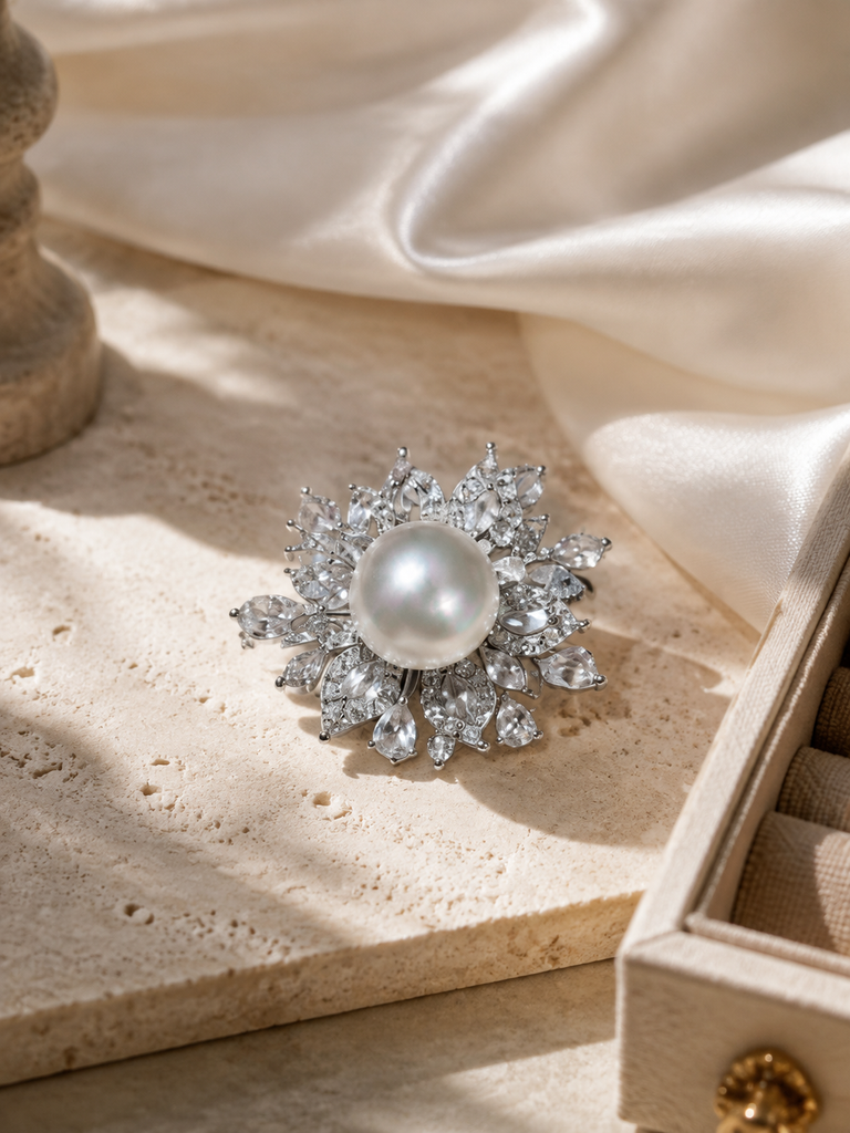 Venus Luster 10-11mm Australian South Sea Pearl Firework Ring in a still-life ivory silk luxury environment