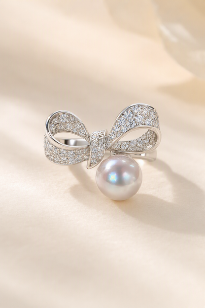 Venus Luster 9-10mm Australian South Sea Pearl Bow Ring on a cream white primary background