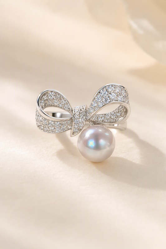 Venus Luster 9-10mm Australian South Sea Pearl Bow Ring on a cream white primary background