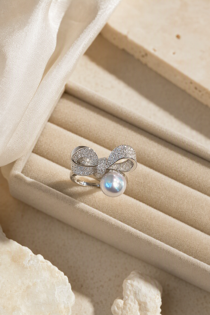 Venus Luster 9-10mm Australian South Sea Pearl Bow Ring in a still-life ivory silk luxury environment