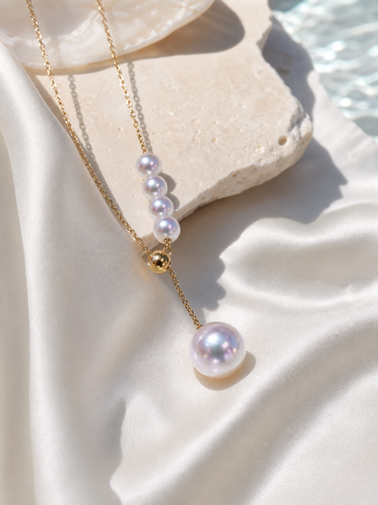 Saltwater Akoya pearl necklace featuring white pearls with blue-pink mirror luster