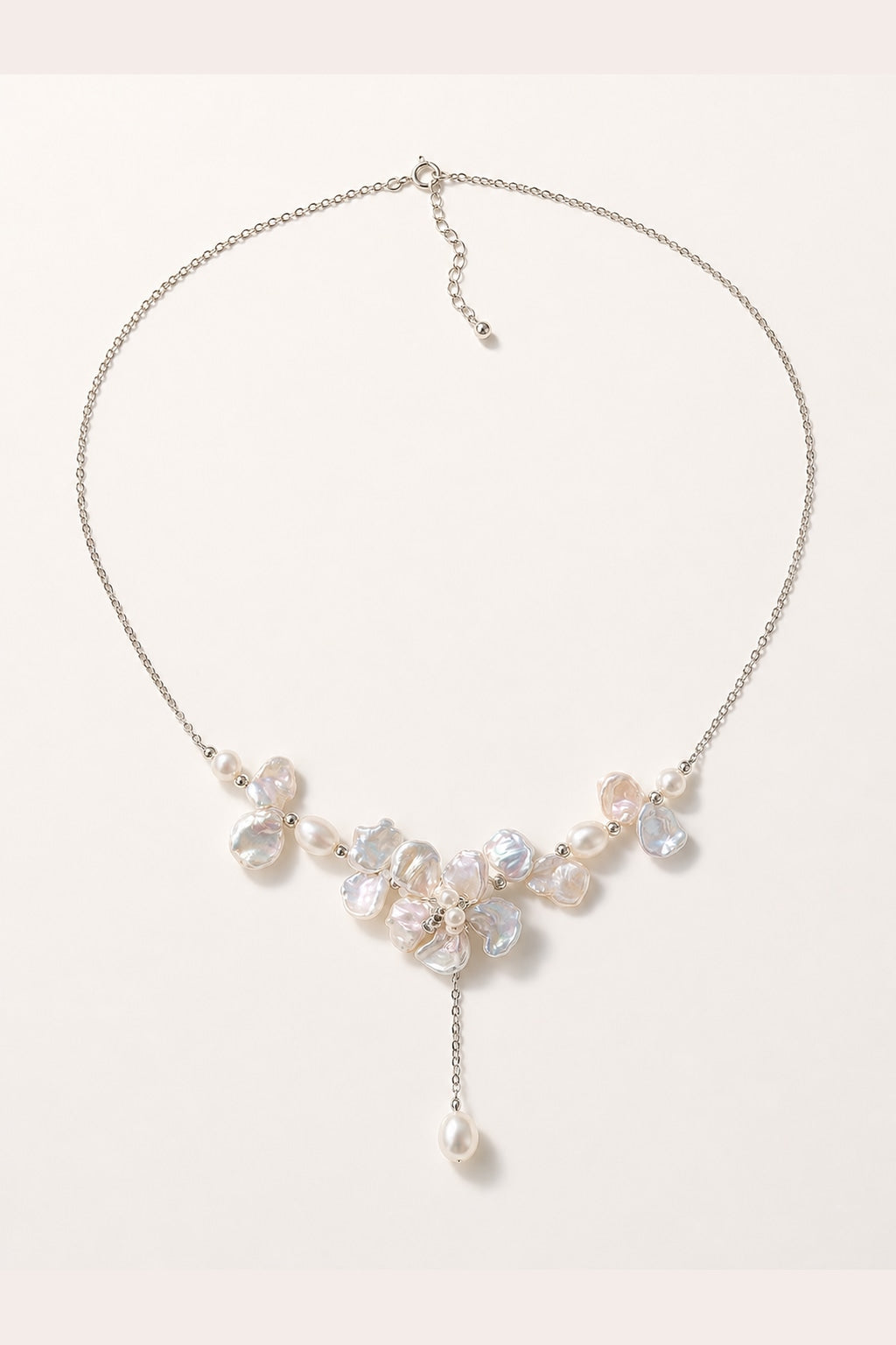 White freshwater baroque pearl necklace with mirror-like luster and silver-tone chain