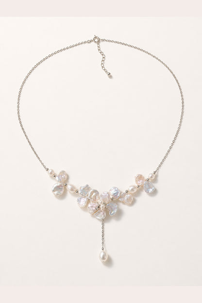 White freshwater baroque pearl necklace with mirror-like luster and silver-tone chain