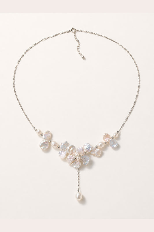 White freshwater baroque pearl necklace with mirror-like luster and silver-tone chain