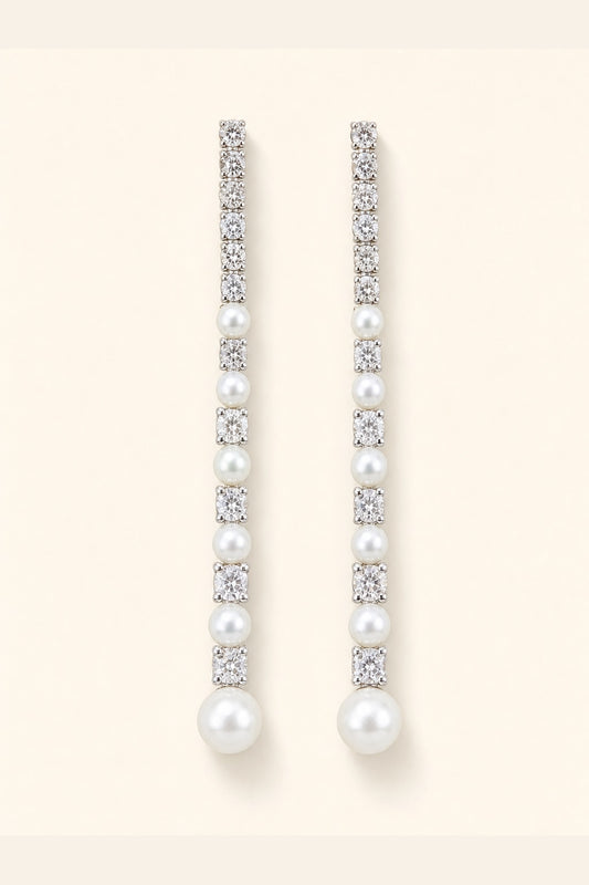 White freshwater pearl meteor earrings with mirror-like luster and silver crystal details