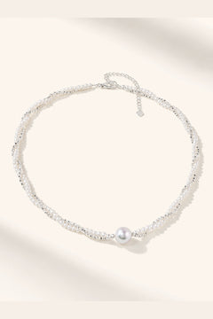 White freshwater pearl necklace with mirror-like luster and 11–12mm statement pearl