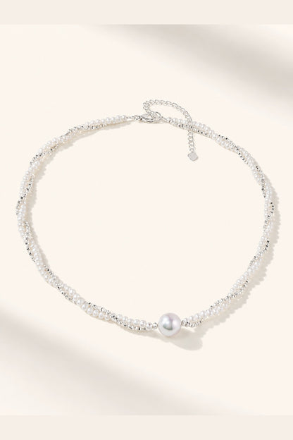 White freshwater pearl necklace with mirror-like luster and 11–12mm statement pearl