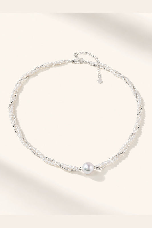 White freshwater pearl necklace with mirror-like luster and 11–12mm statement pearl